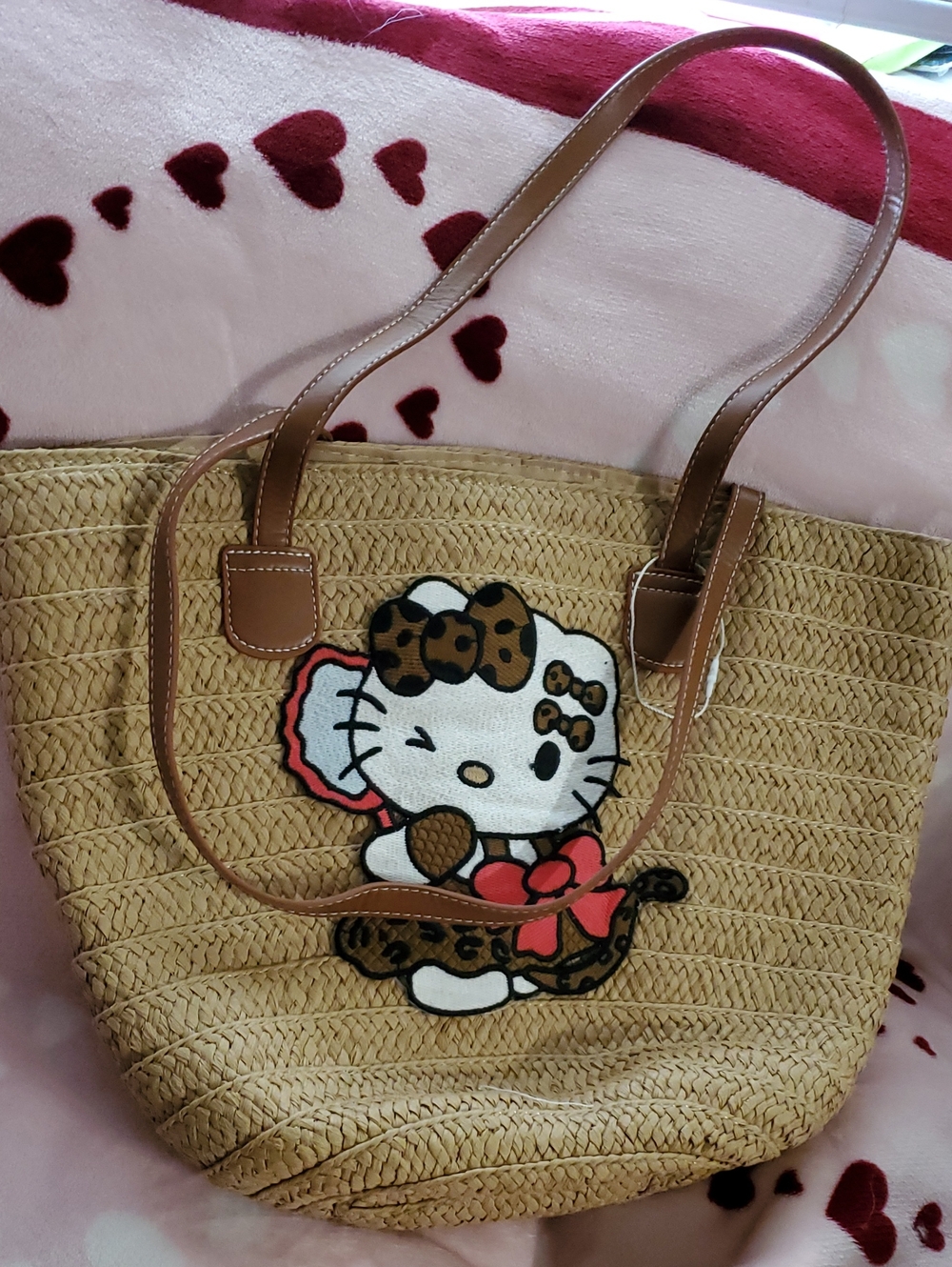 Hello Kitty Straw Tote in Tan with Brown Handles and Red Accent